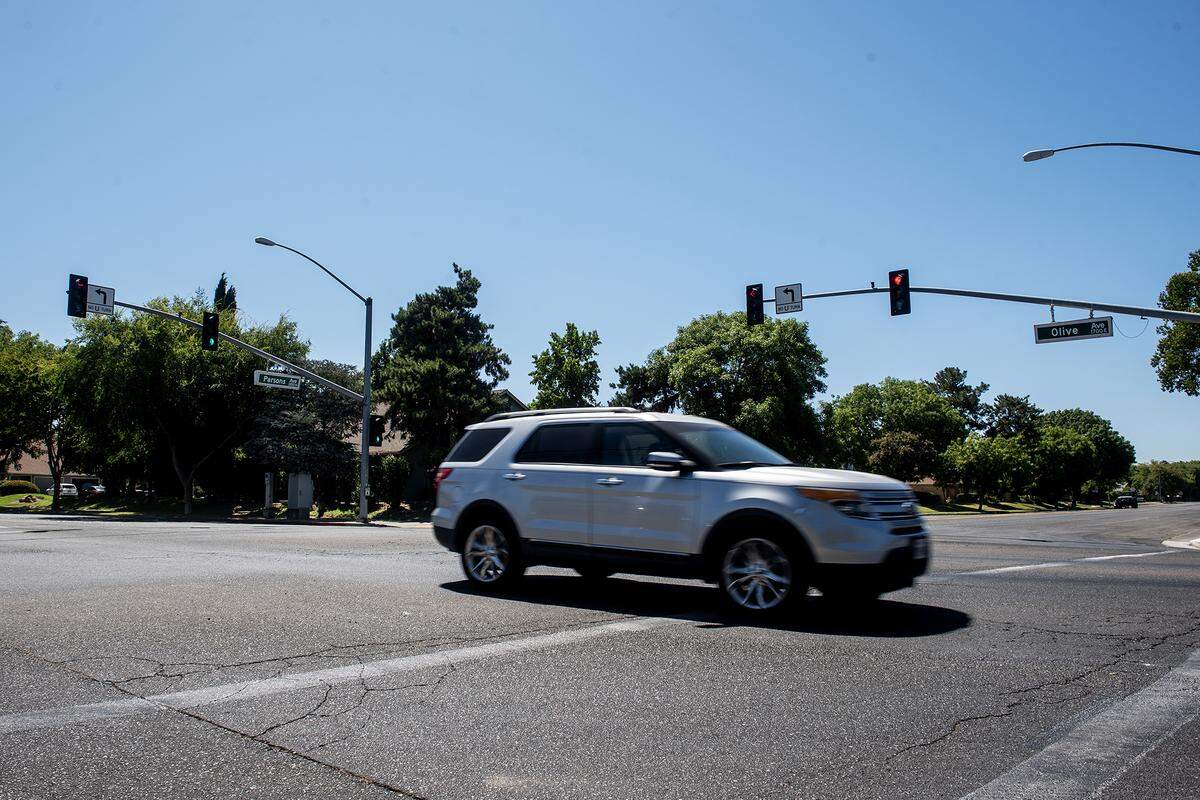 Traffic flows through the intersection of Olive and Parsons avenues in Merced, Calif., on Thursday, July 31, 2025. 
