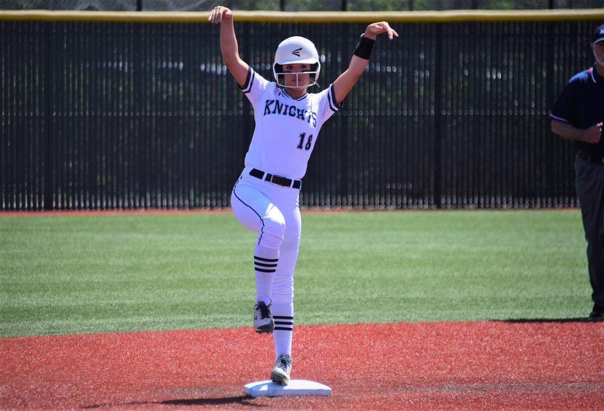 Stone Ridge Christian High sophomore Cali Cole celebrates after hitting a double during the Sac-Joaquin Section Division VII championship game against Big Valley Christian on Saturday, May 21, 2022 at the San Joaquin Delta Softball Complex in Stockton, Calif.