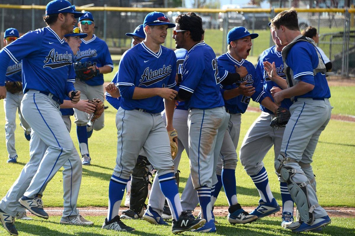 Atwater players celebrate following a game against Buhach Colony at Buhach Colony High School in Atwater, Calif., on Tuesday, April 2, 2019.