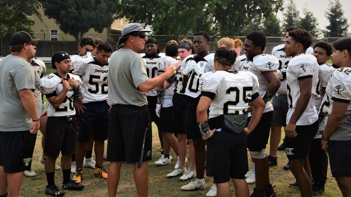 Buhach Colony head coach Jerry Dietz talks to the team at the end of practice on Wednesday, Aug. 18, 2021.