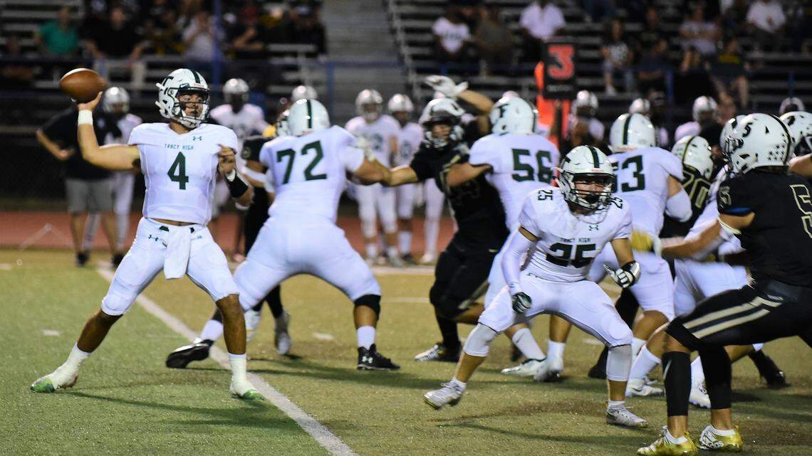 Tracy High quarterback Logan Fife fires a pass against Buhach Colony. Fife threw two touchdowns, but the Bulldogs fell to Buhach Colony 35-21 on Aug. 30, 2019 in Atwater, Calif.
