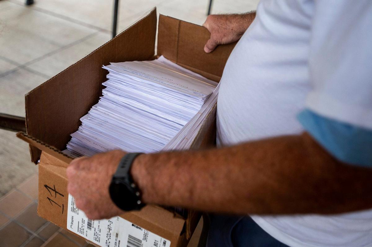The Committee for a Safer Merced submits thousands of voter signatures collected in support of renewing Measure C funding in Merced, Calif., on Monday, Aug. 21, 2023. The half-cent sales tax approved in 2006, funds public safety positions as well as providing resources for emergency responses and road improvements. The measure is set to expire in 2026.