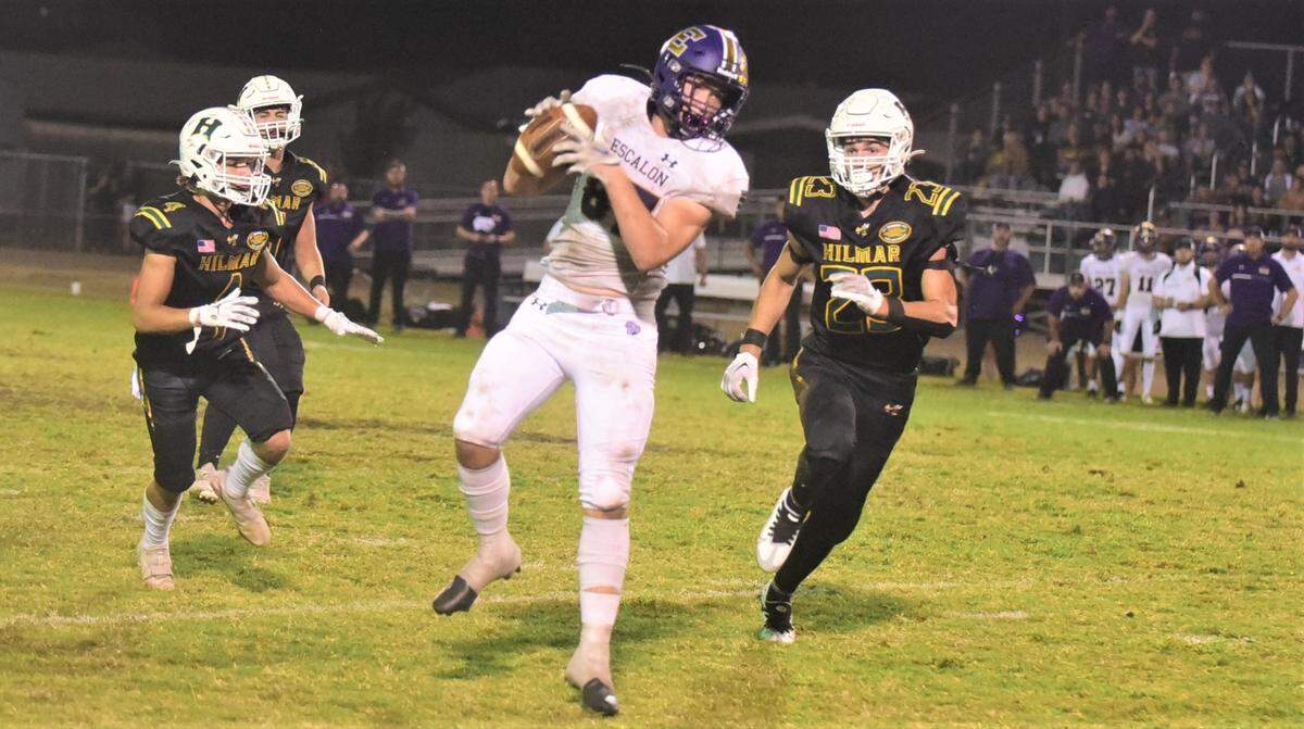 Escalon High sophomore Ryan Lewis catches a pass against Hilmar during a game on Sept. 30, 2022.