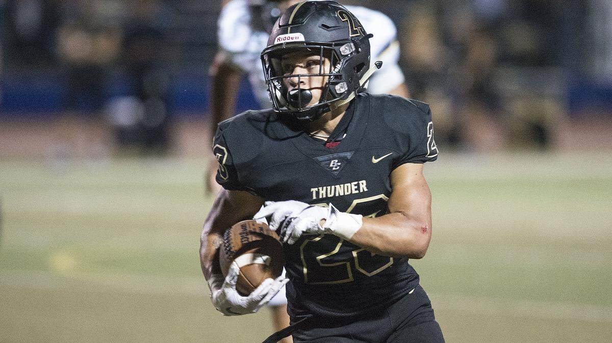 Buhach Colony junior Youlas Dickson III (23) rushes toward the sideline during a game against Gregori at Atwater High School in Atwater, Calif., on Friday, Aug. 17, 2018. The Thunder beat the Jaguars 13-6.