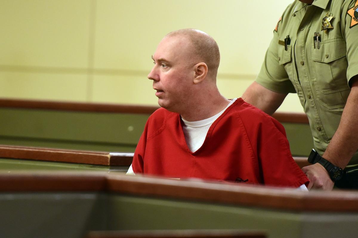 Kevin Mayhew is pushed into Merced County Court by a bailiff on Monday, Dec. 10, 2018, in the attempted murder trial in which he is representing himself.