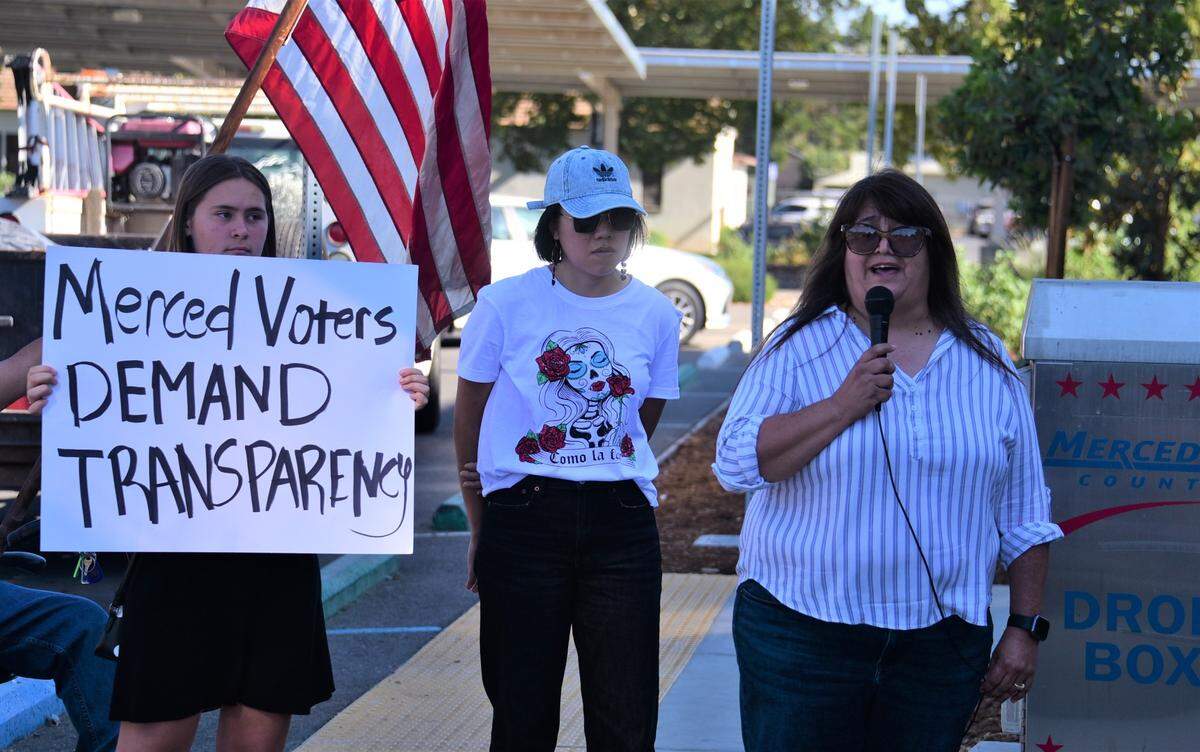 Merced City Council Member Bertha Perez speaks to protesters Friday, Oct. 14, 2022, outside the Merced County Elections Office about errors that appeared on election ballots sent out in some Merced County precincts.