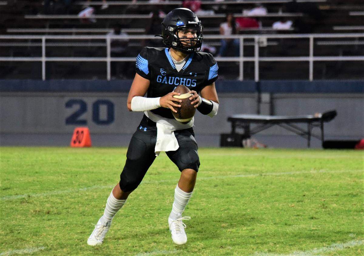 El Capitan High School senior quarterback Brian Carlson drops back to pass during a game against Cordova on Friday, Aug. 25, 2023 at Merced College’s Stadium ’76.