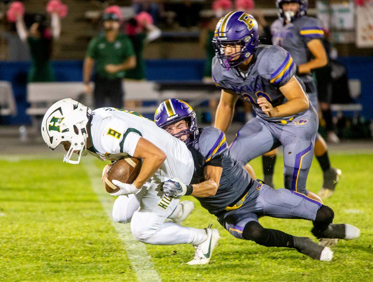 Caden Bailey, 9 of Hilmar High gets taken down by Chase Cummings, 14, of Escalon High Friday Oct. 13, 2023.