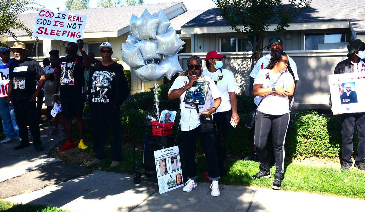 Marylene Riley speaks to the crowd during the 14th annual Riley Brothers Victims Remembrance Walk on Saturday, Oct. 14, 2023, in Merced, Calif.