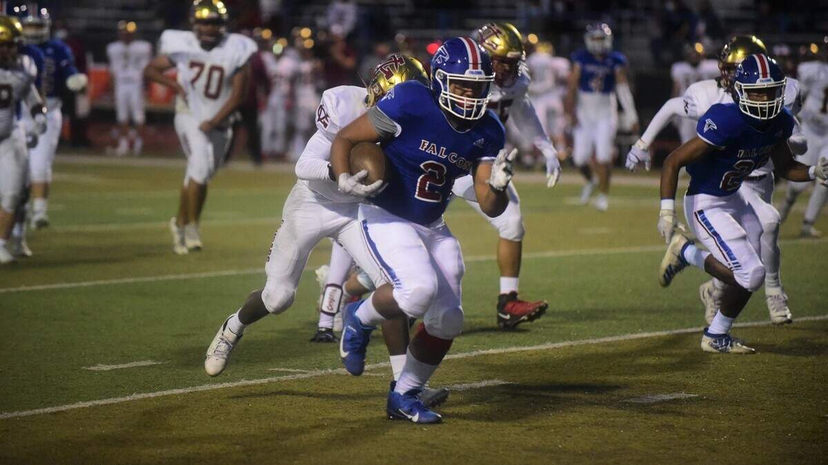 Atwater High running back James Thomas (21) rushed for 118 yards and three touchdowns in the Falcons’ 40-7 win over Golden Valley on Friday, March 26, 2021 at Dave Honey Stadium in Atwater, Calif.