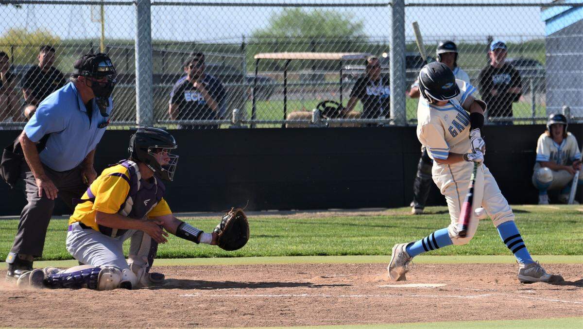 El Capitan High School sophomore Camden Peterson connects on a two-run single during the second inning of an 11-0 win over Escalon on Thursday, April 27, 2023 at El Capitan High School.