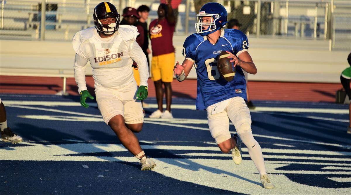 Atwater High School junior quarterback James Bell (60) rolls out of the pocket during a scrimmage against Edison of Stockton on Friday, Aug. 11, 2023 at Dave Honey Stadium in Atwater, Calif.