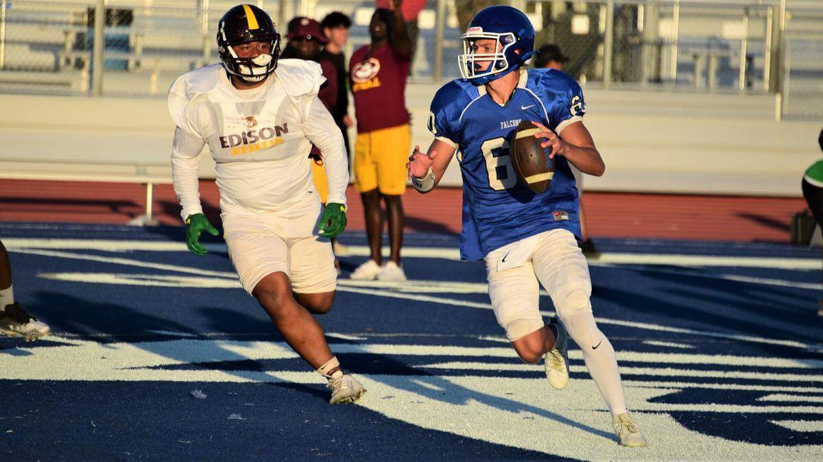 Atwater High School junior quarterback James Bell (60) rolls out of the pocket during a scrimmage against Edison of Stockton on Friday, Aug. 11, 2023 at Dave Honey Stadium in Atwater, Calif.