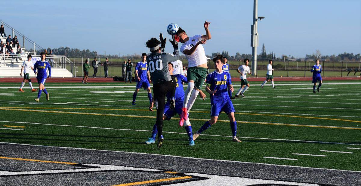 Hilmar High junior Jose Guerrero looks to head in a shot against Linden during the Sac-Joaquin Section Division V championship with a 5-4 overtime win over Linden at Liberty Ranch High School in Galt, Calif. on Saturday, Feb. 22, 2020.
