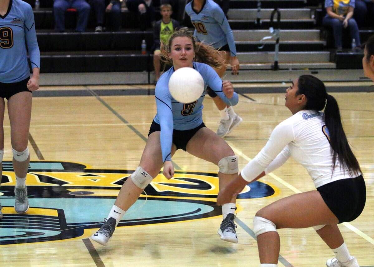 El Capitan’s Natalie Collins (5) and Valeria Torres (0) both go for the ball in the Gauchos’ match against Buhach Colony on Monday night at El Capitan High School.