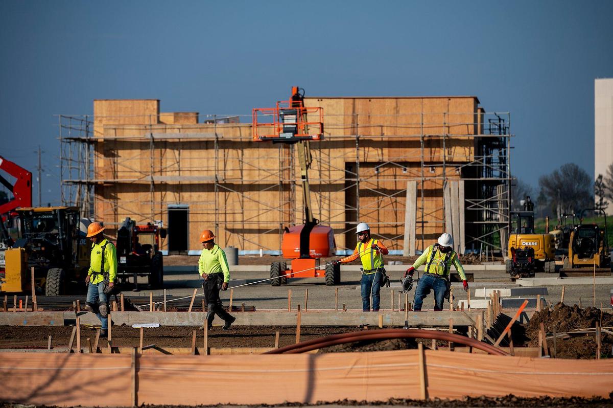 Construction continues at the 21.5-acre Yosemite Crossing site located near the intersection of Yosemite Avenue and G Street in Merced, Calif., on Thursday, Jan. 20, 2022.