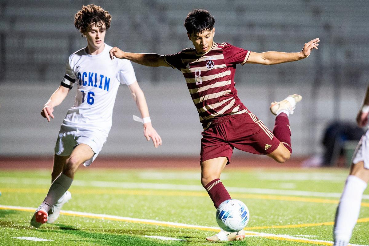 Golden Valley senior Giovanny Ramirez (8) attempts a shot on net during a Division 2 playoff game against Rocklin at Golden Valley High School in Merced, Calif., on Tuesday, Feb. 13, 2024. The Cougars beat the Thunder 3-0.
