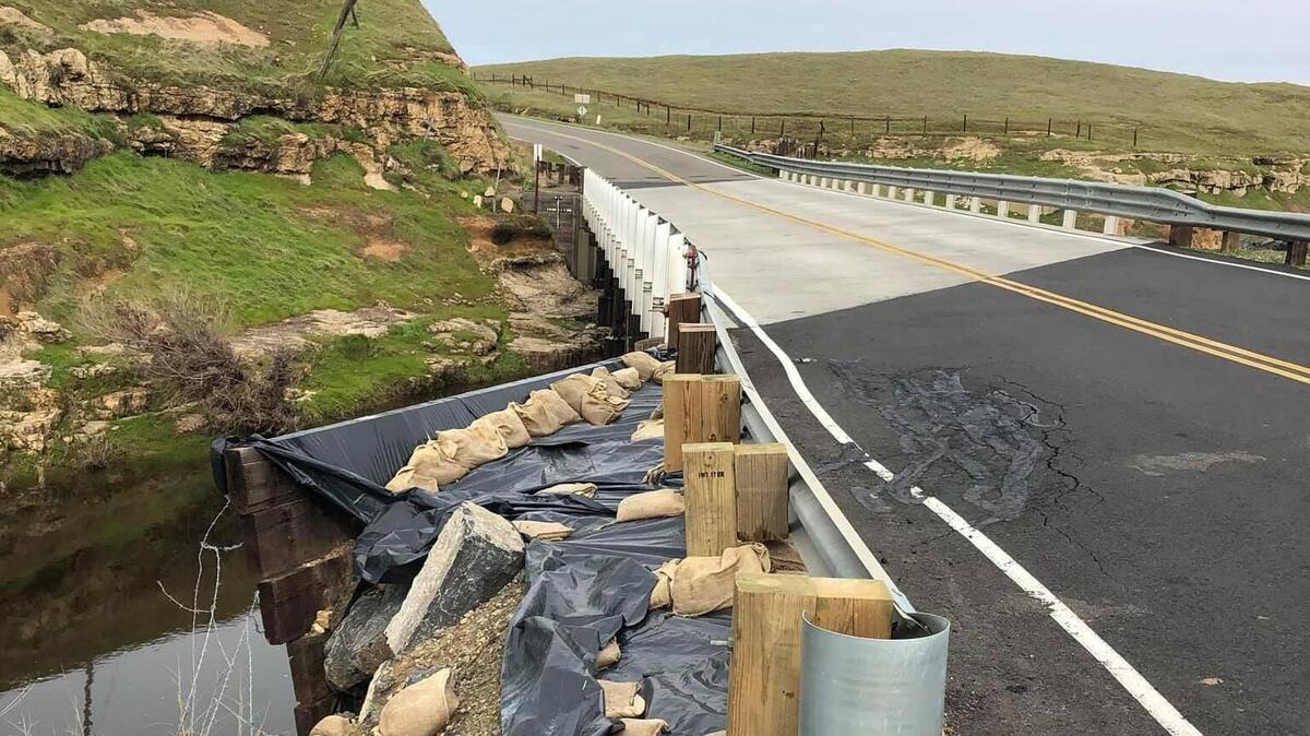 Merced County has closed La Grange Road between Highway 59 and Highway 132 on Tuesday, after crews found cracks in the asphalt and dirt washed away from the support structures of a a bridge spanning Dry Creek. Photo courtesy of Merced County.