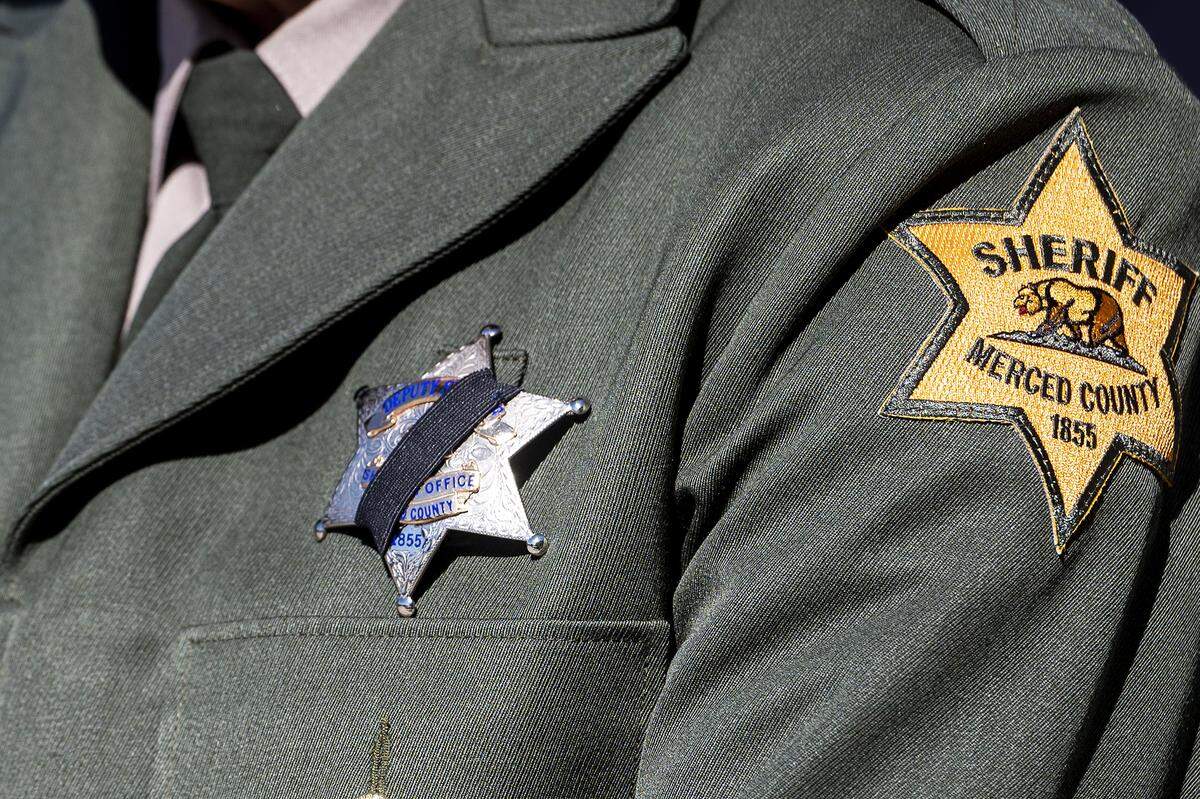 Law enforcement personnel look on during the annual Merced County Peace Officers Memorial Ceremony in Merced, Calif., on Wednesday, May 29, 2024. The ceremony honors law enforcement officers who died in the line of duty.
