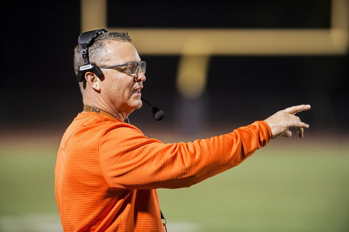 Merced head coach Rob Scheidt calls out to his players during a CIF Sac-Joaquin Section Division III playoff game against River Valley at Veterans Stadium in Merced, Calif., on Friday, Nov. 9, 2018. The Falcons beat the Bears 45-40.