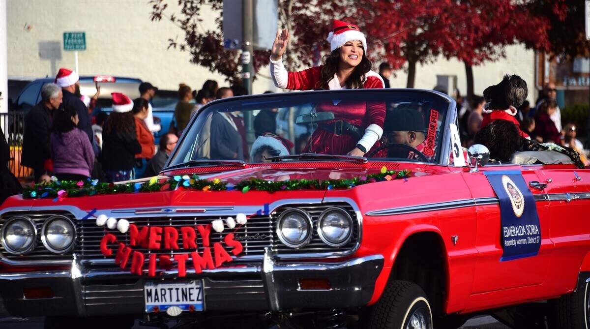 State Assemblywoman Esmeralda Soria waves to the crowd during the Merced Christmas Parade on Saturday, Dec. 2, 2023 in Merced, Calif.