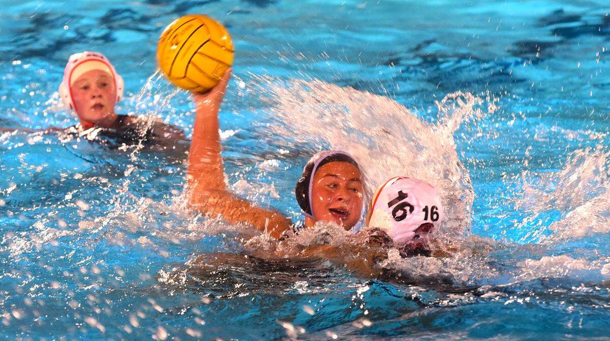 El Capitan High School senior Kiryn Wicker (14) looks for a shot as Merced freshman Sarah Slocum defends during a semifinal game at El Capitan High School on Tuesday, Nov. 7, 2023.