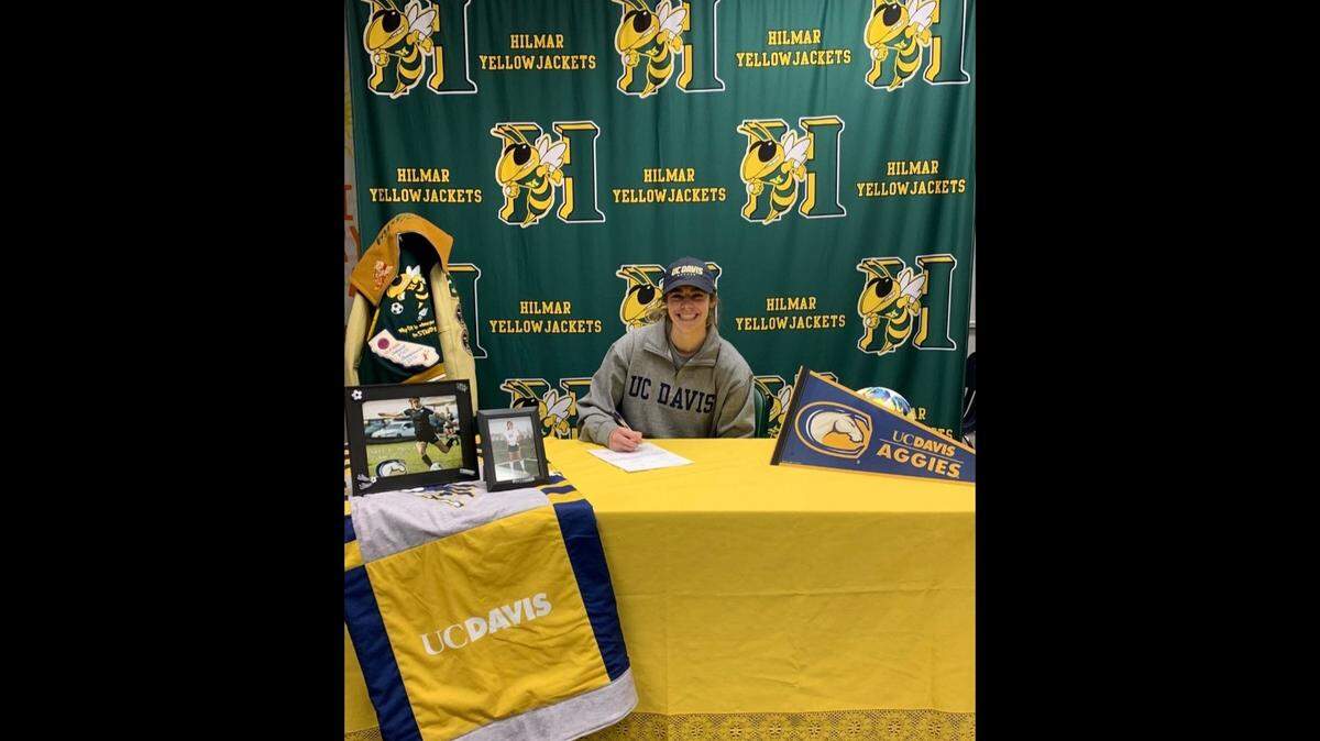 Hilmar High senior Genavieve Fontes recently signed her national letter of intent to accept a soccer scholarship to UC Davis.