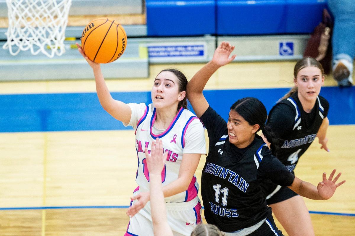 Atwater junior Andrea Sandoval (10) attempts a layup against during a CIF Sac-Joaquin Section Division 2 playoff game against Mountain House at Atwater High School in Atwater, Calif., on Wednesday, Feb. 14, 2024. The Falcons beat the Mustangs 95-59.