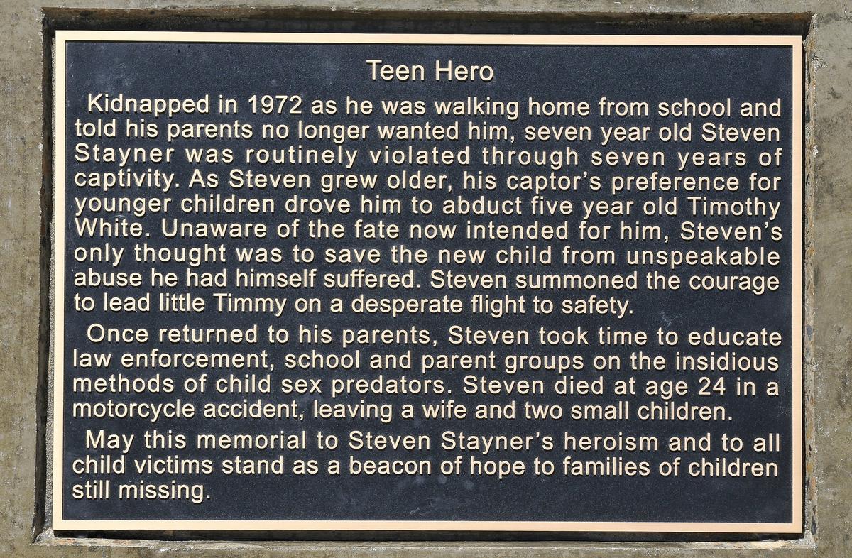 SUN-STAR PHOTO BY LISA JAMES A plaque on the base of Applegate Park’s new Steven Stayner statue tells the story of the Merced native’s 1972 abduction and his heroic act of saving 5-year-old Timmy White who his kidnapper abducted 8 years later. Stayner championed the cause of missing children until his untimely death at the age of 24 in 1989. A plaque bearing the names of other missing children in Merced County will later be added. August 27, 2010