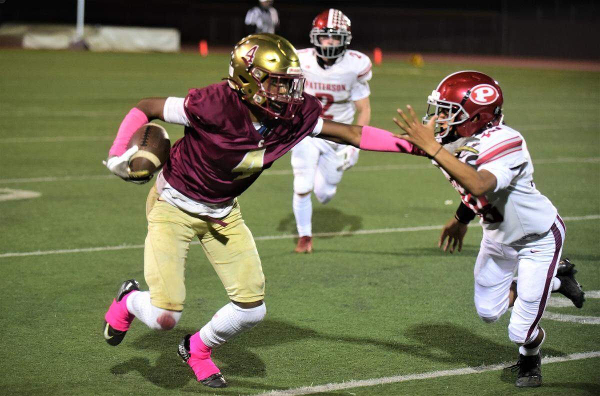 Golden Valley receiver Delbert Davis (4) breaks free for a 58-yard touchdown catch in the third quarterback against Patterson on Friday, Oct. 14, 2022 at Veterans Stadium in Merced, Calif.