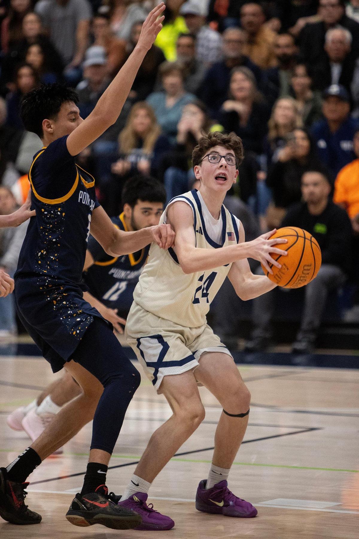 Stone Ridge Christian freshman Colton Trost (24) looks to the basket during a CIF NorCal Division VI playoff game against Point Arena at Stone Ridge Christian High School in Merced County, Calif., on Wednesday, March 5, 2025. The Knights beat the Pirates 71-60.