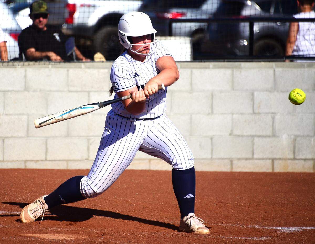 Stone Ridge Christian High senior Mackenzie Silva delivers the go-ahead, two-run single in the fifth inning in a semifinal playoff game against Argonaut on Thursday, May 16, 2024.