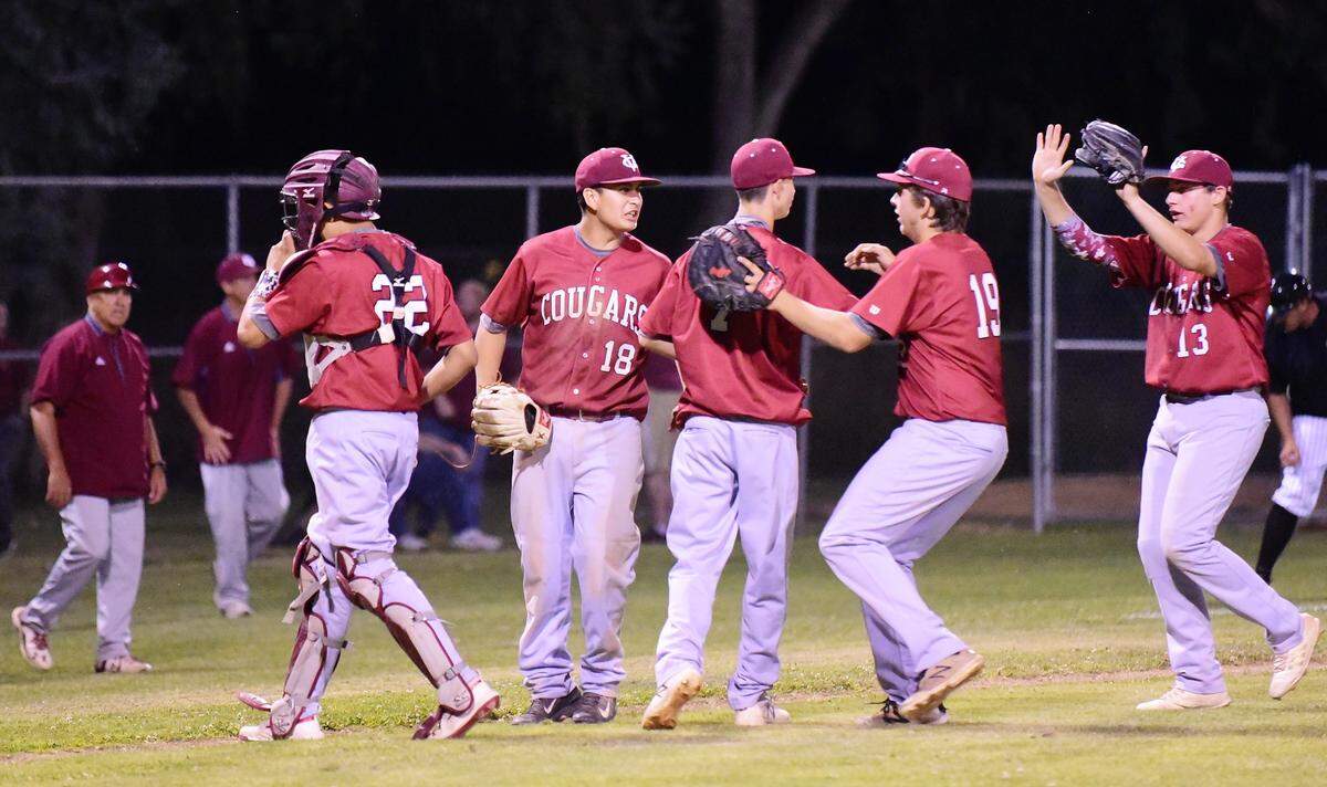 The Golden Valley High baseball players celebrate a 2-1 win over Merced on Friday, May 3, 2019 at Merced High.