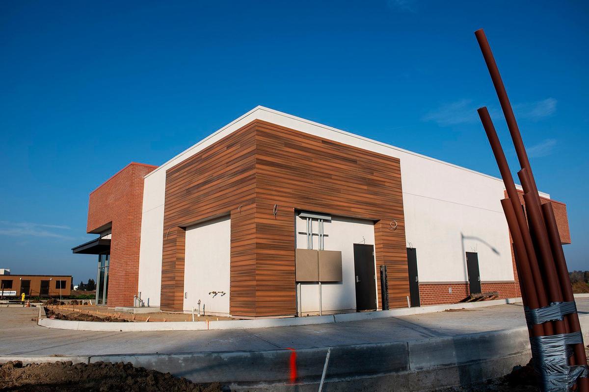 Construction continues at the 21.5-acre Yosemite Crossing site located near the intersection of Yosemite Avenue and G Street in Merced, Calif., on Thursday, Jan. 20, 2022.