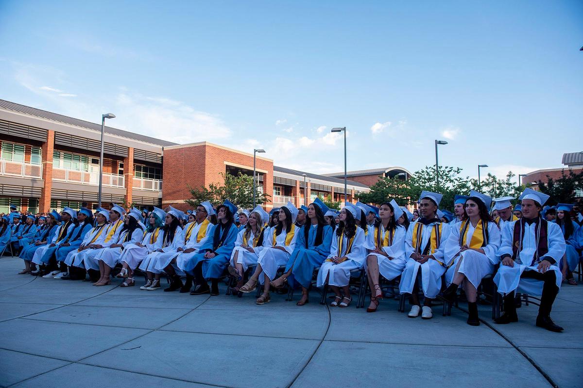Graduates listen to fellow graduate speakers during a commencement ceremony for the El Capitan High School class of 2022 on the El Capitan High School campus in Merced, Calif., on Thursday, June 2, 2022.