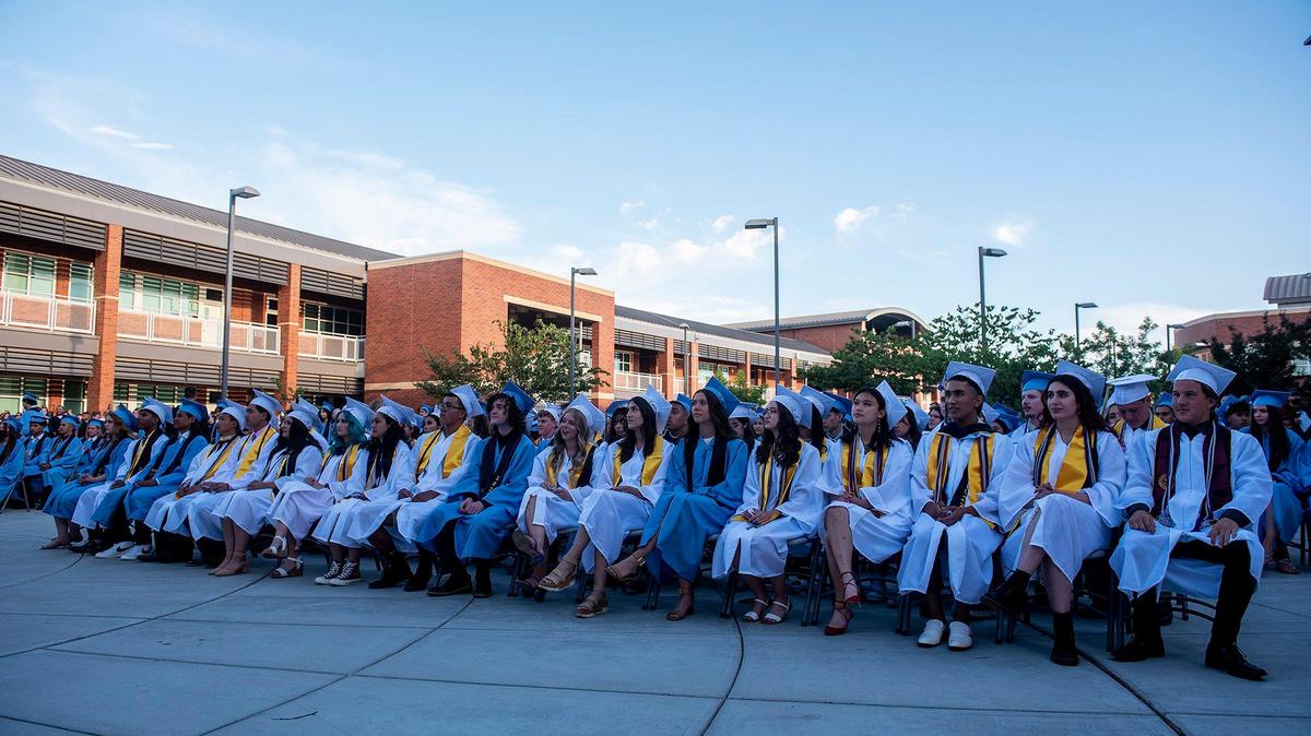 Graduates listen to student speakers during a commencement ceremony for the El Capitan High School Class of 2022 on the El Capitan High School campus in Merced in June 2022.