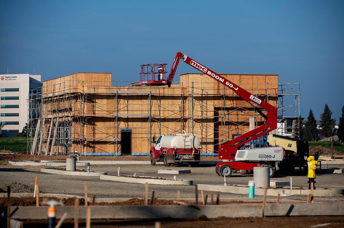Construction continues at the 21.5-acre Yosemite Crossing site located near the intersection of Yosemite Avenue and G Street in Merced, Calif., on Thursday, Jan. 20, 2022.