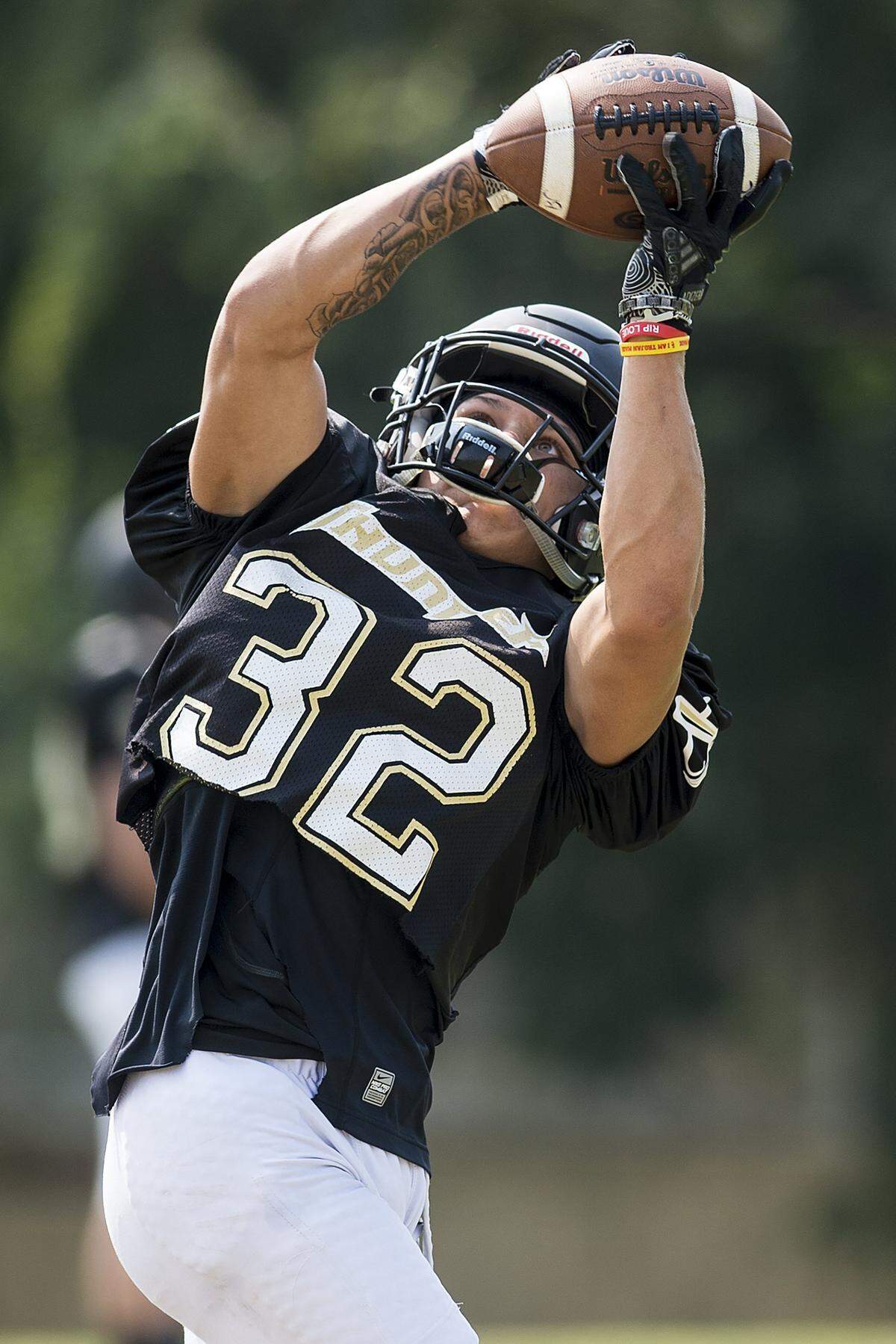 Buhach Colony’s Youlas Dickson III catches a pass during football practice at Buhach Colony High School in Atwater, Calif., on Tuesday, July 31, 2018.