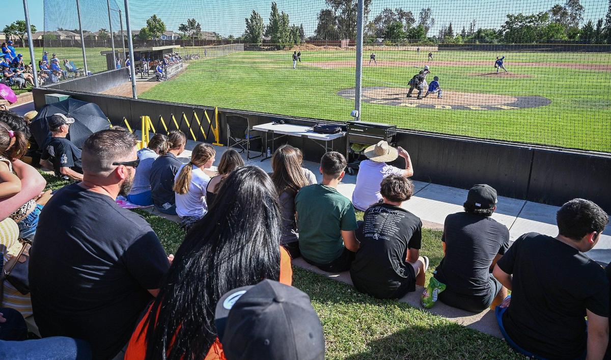 Buhach Colony and Del Campo fans watch the action between the two teams during their playoff game at Buhach Colony in Atwater on Friday, May 20, 2022.