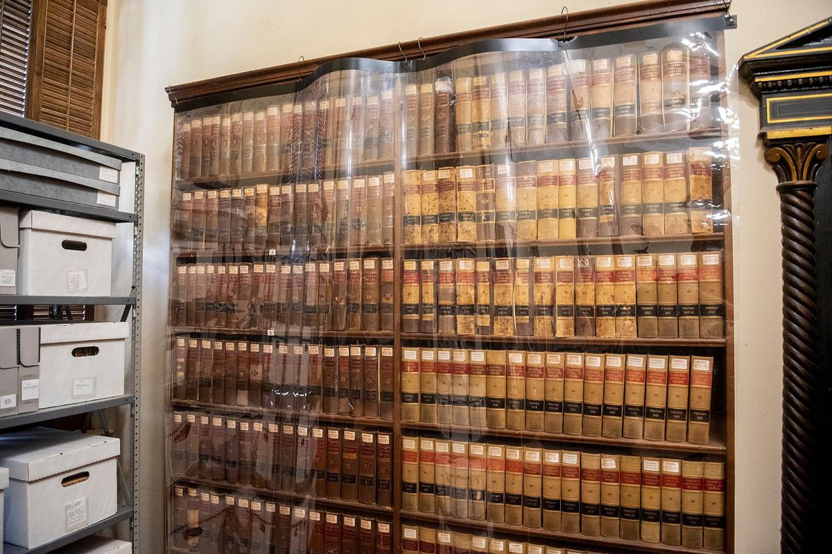 Various California reports inside the collection of archives at the Merced County Courthouse Museum in Merced, Calif., on Wednesday, Sept. 18, 2024. Built in 1875, the building served as a courthouse until 1950 and as a county administration building until 1970. The building opened as a history museum in 1983.