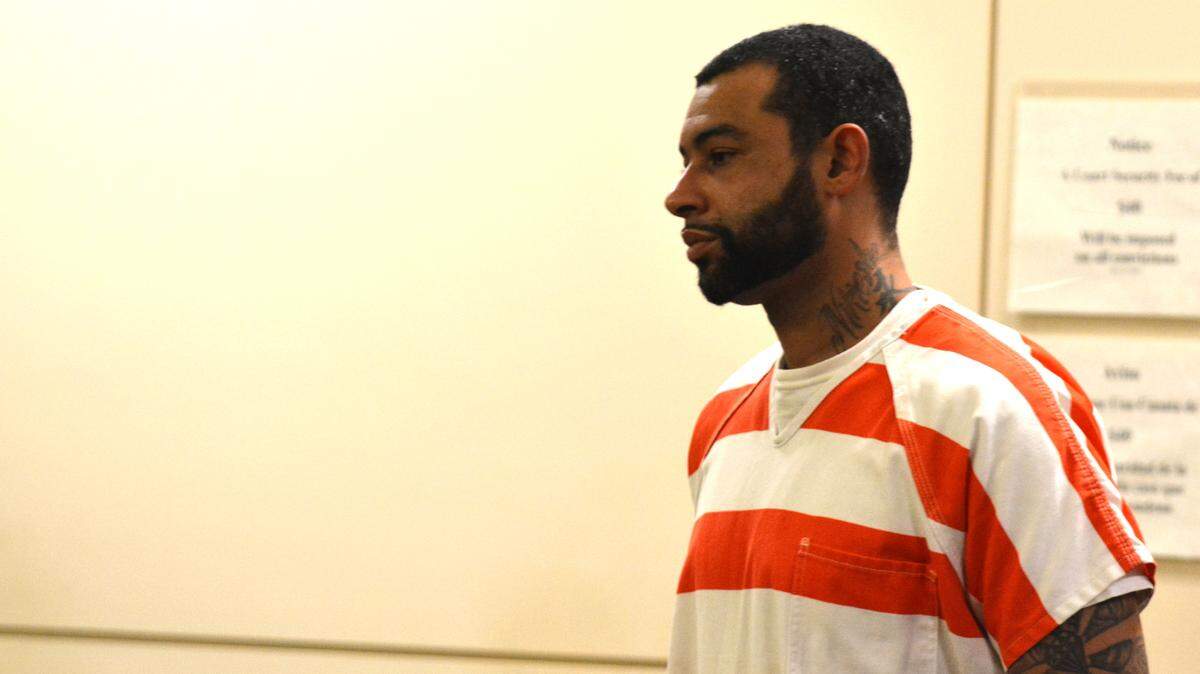 Jerome Slayton, 30, of San Jose, walks into a courtroom in Merced Superior Court Friday, Aug. 10, 2018, in Merced. Slayton pleaded not guilty to killing 29-year-old Michael Riley in Merced in 2008. Charges were dismissed Friday and Slayton was re-arrested as prosecutors plan to re-file the charges.