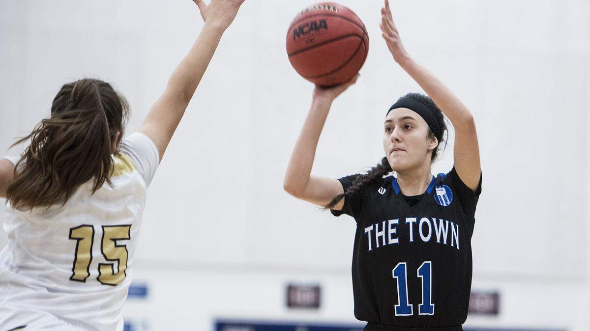 Atwater senior Lexi Valencia (11), shown here in a game against Buhach Colony earlier this year, scored 19 points to help Atwater rout El Capitan 76-31 on Tuesday night at Atwater High.