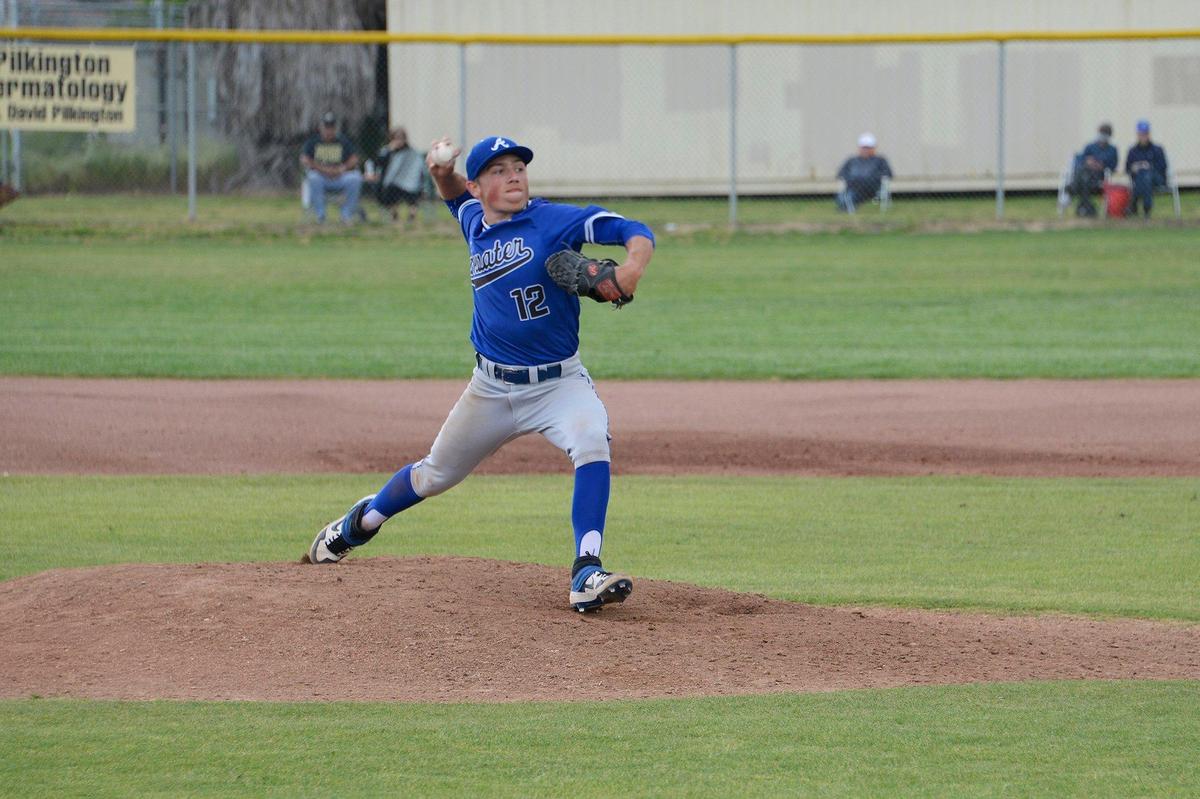 Atwater junior pitcher Nathaniel Silva (12) delivers a pitch during a game against Buhach Colony at Buhach Colony High School in Atwater, Calif., on Tuesday, April 2, 2019.