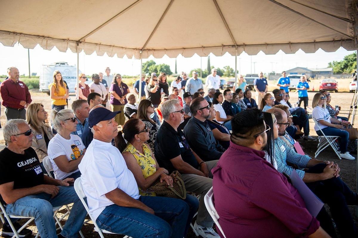 Members of the community look on during a groundbreaking ceremony at Community Park 42 which is slated to become a regional sports complex in Merced, Calif., on Wednesday, July 26, 2023. The nearly 40 acre park which is located at the corner of Mission Avenue and Tyler Road in south Merced, will feature soccer and football fields as well as basketball courts, tennis courts, pickle ball courts and a futsal court, according to the city. The park will also feature restroom facilities, concessions, pavilions, playgrounds and a walking path.