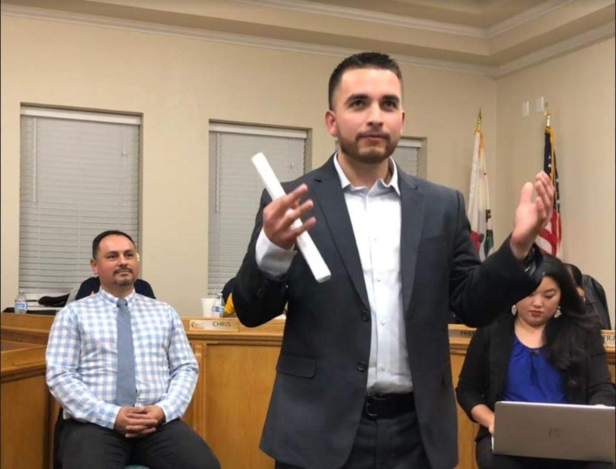 Ricky Aguilera, the general manager of Merced Indoor Sports and a district 2 hopeful, speaks at the NAACP candidates night.
