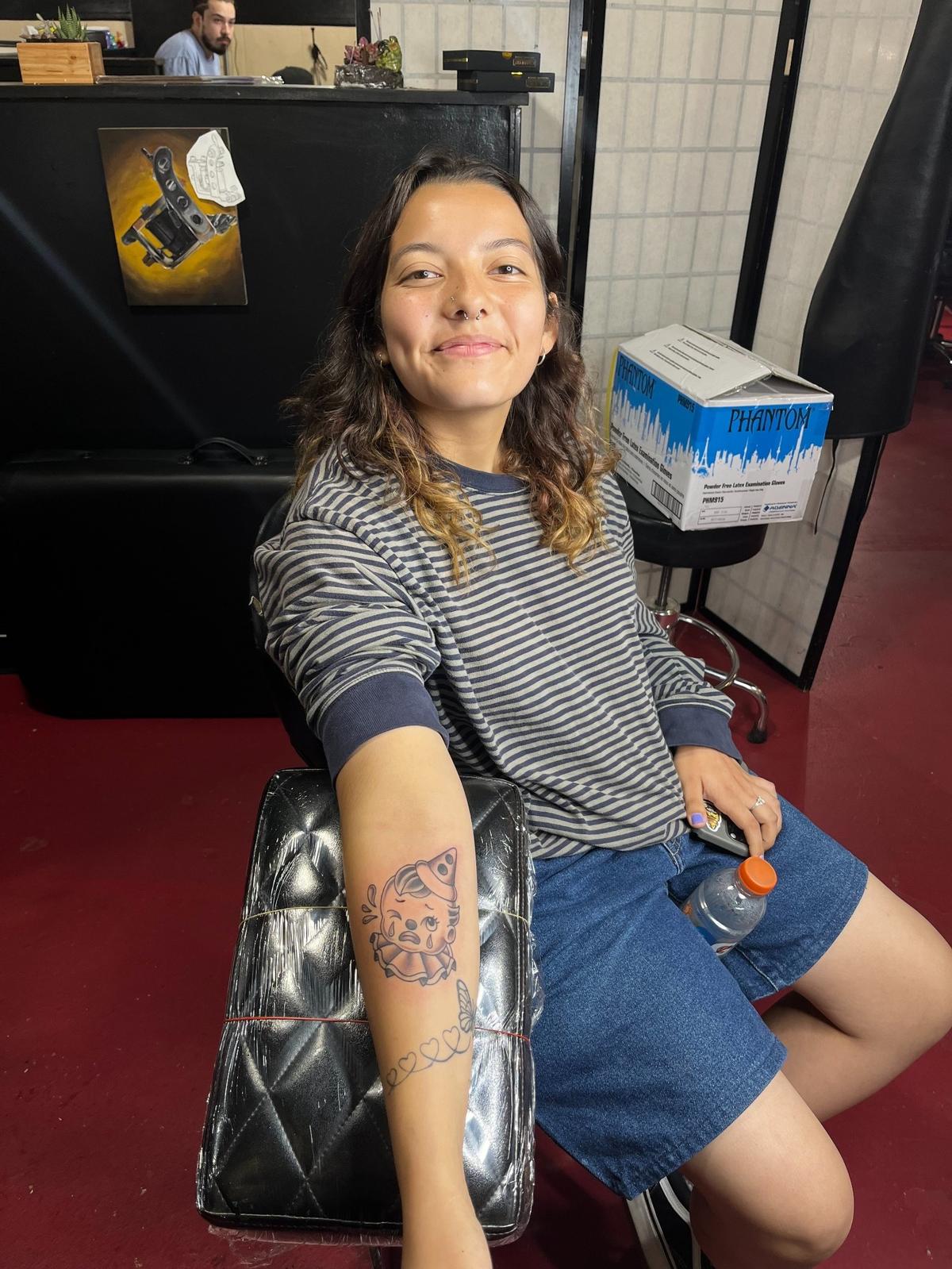 Customer shows off new Friday the 13th tattoo by Main Street Tattoo and Body Piercing artist, “Little” Johnny Tharp. The shop’s team welcomed close to 200 guests in the span of 12 hours on Friday Sept. 13, 2024. They will host the next Friday the 13th event on Dec. 13. Courtesy of “Little” Johnny Tharp.