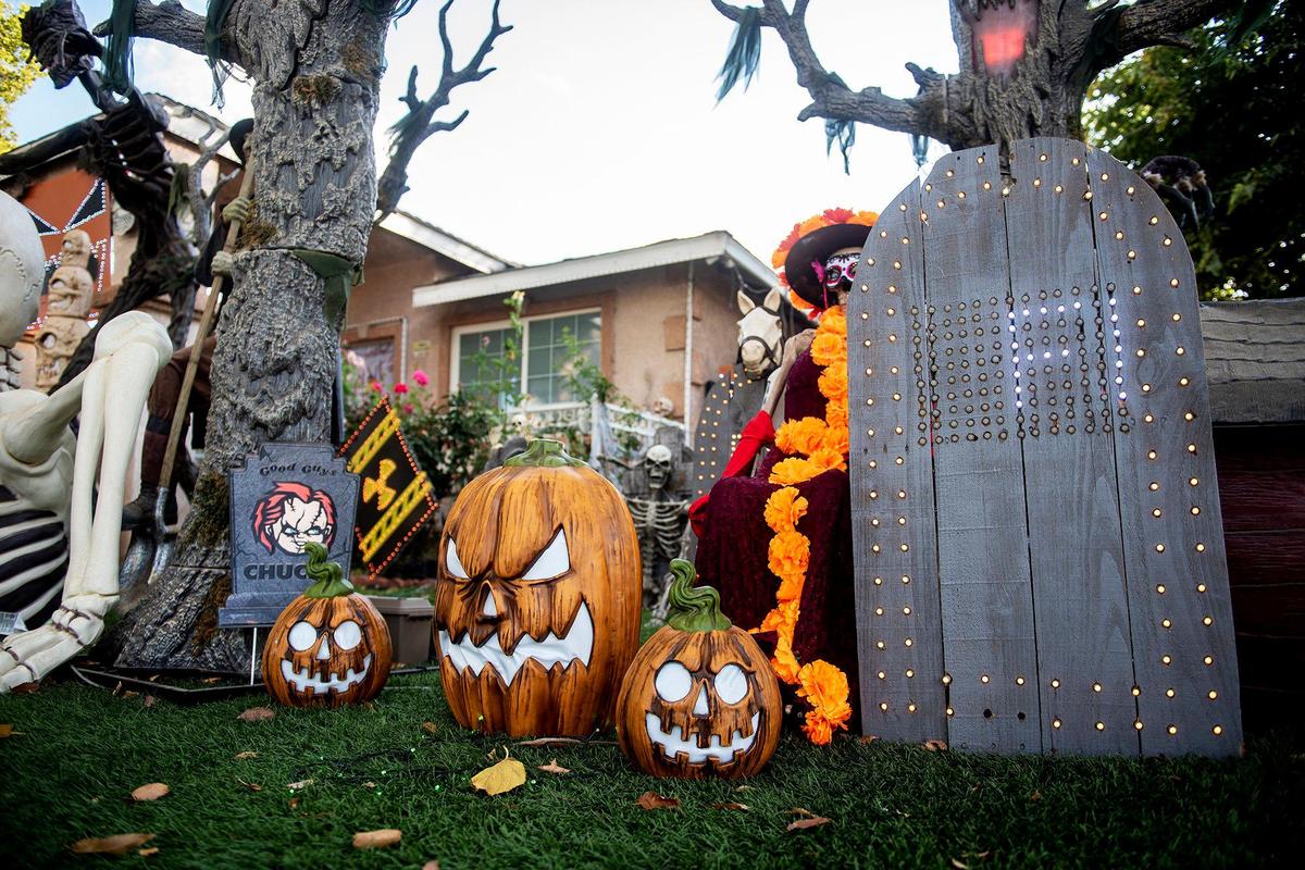 Halloween decorations fill the yard of Miguel Avila, 28, at his home on West 9th Street in Merced, Calif., on Thursday, Oct. 17, 2024.