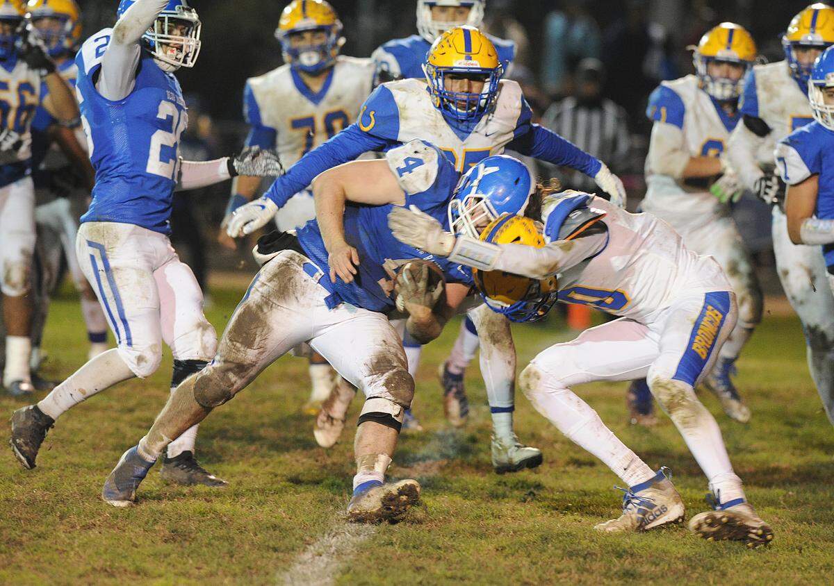 Dos Palos’ Zane Merrell can’t stop Caruthers High School running back, Bobby Staley as he scores a touchdown Friday, Nov. 29, 2019 with 14 seconds left in the game to put Caruthers up 25-22.