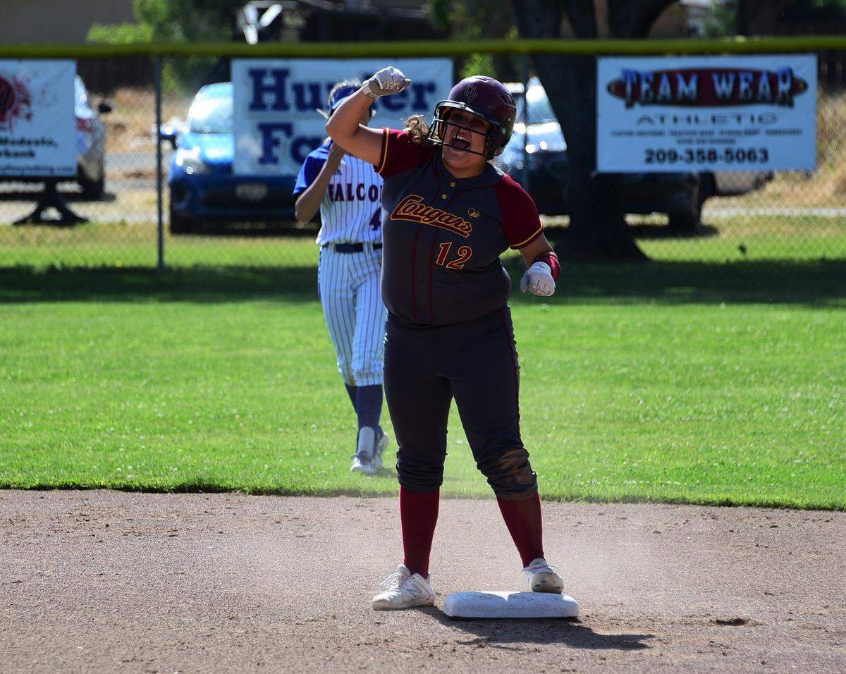 Golden Valley High senior Maddie Martinez celebrates after hitting a double in the first inning during the Cougars’ 2-0 win over Atwater on Monday, May 6, 2019.
