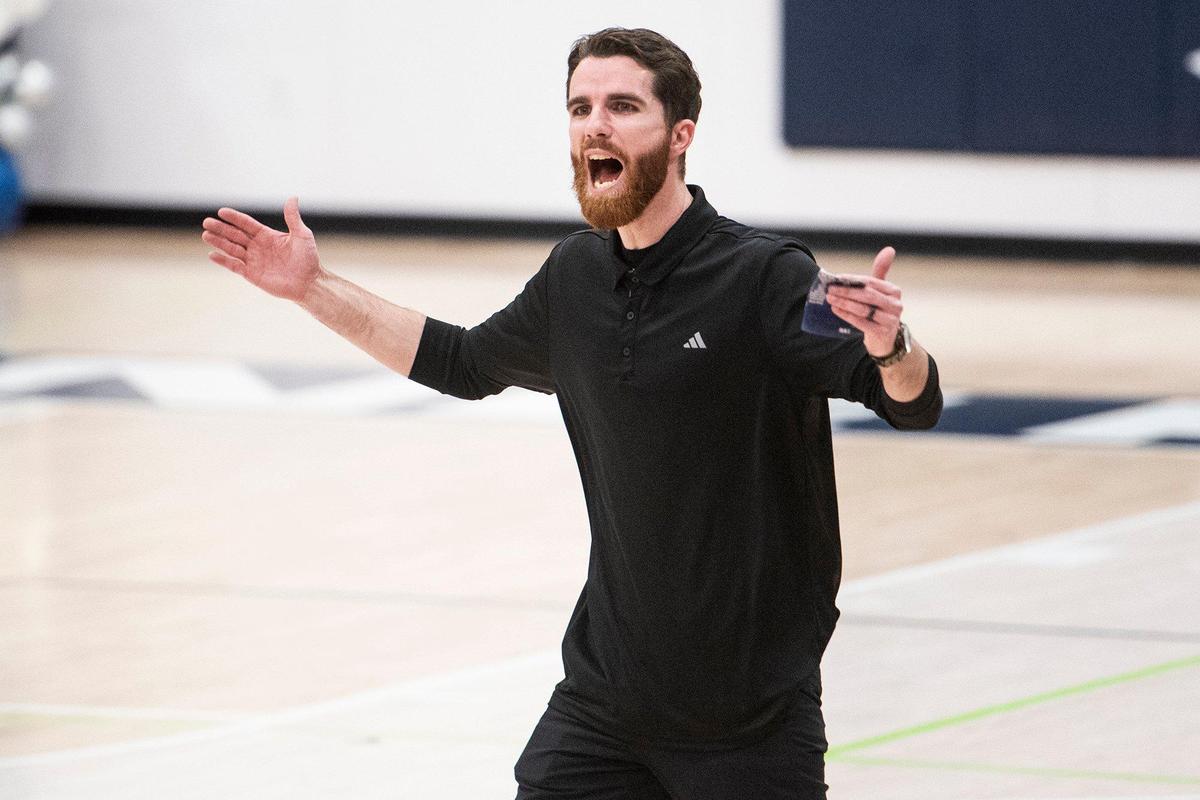 Stone Ridge Christian head coach Tyler Rogers calls for timeout during a CIF Sac-Joaquin Section Division 6 playoff game against Sacramento Waldorf at Stone Ridge Christian High School in Merced, Calif., on Tuesday, Feb. 20, 2024. The Knights beat the Wave 50-37.